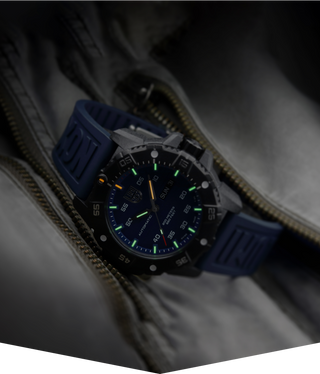 Master Carbon SEAL Automatic, 45 mm, Military Dive Watch - 3863, UV Shot with green and orange light tubes.
