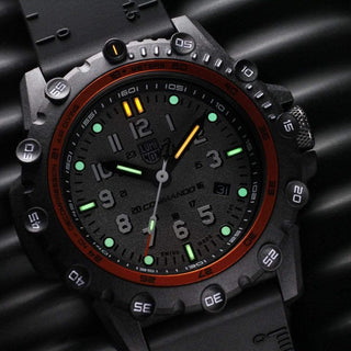 Commando Frogman, 46 mm, Military Dive Watch - 3301, UV Shot with green and orange light tubes and focus on the watch dial